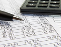 pen paper with numbers on it and keyboard