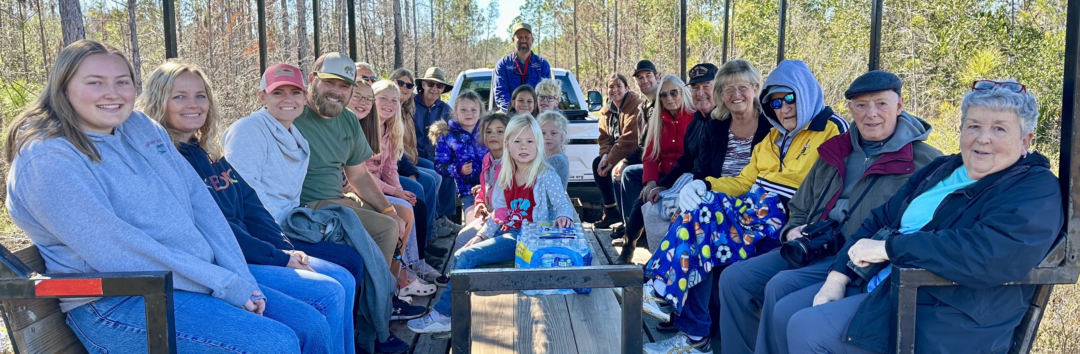Image of citizens on the eco-buggy.