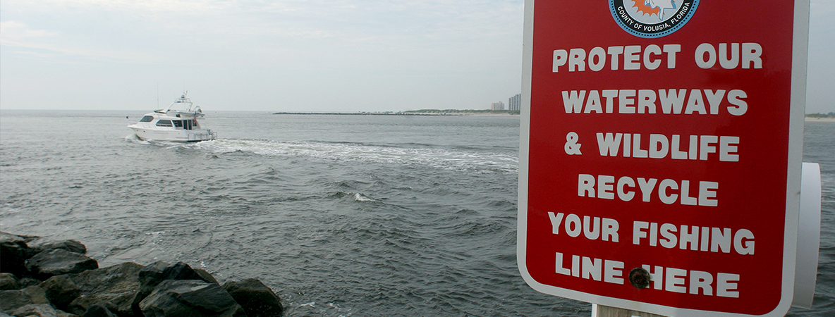 protect our waterways and wildlife. recycle your fishing line here sign.