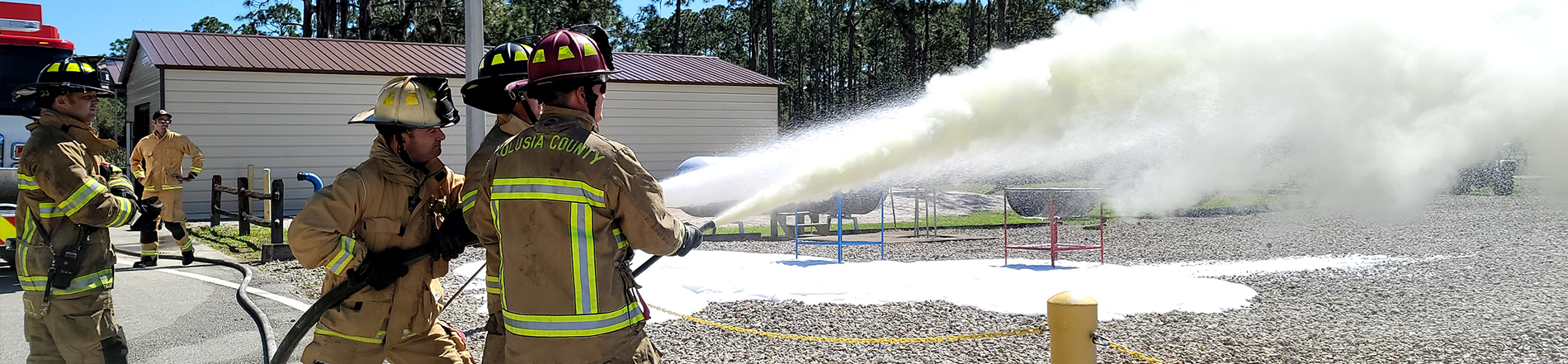 volusia county firefighters spraying exercise