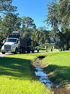 Roadside ditch crew continued drainage maintenance