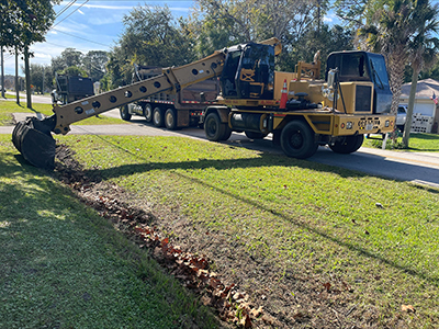 Crews cleaning ditches