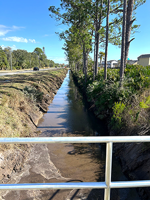 Crews removing debris from the Flomich Canal