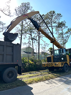 Crews removing debris from the Flomich Canal