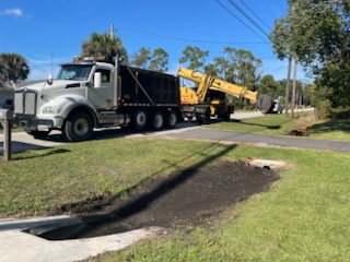 Crew from Road & Bridge working along Old Mission Road in New Smyrna Beach
