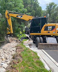 Crews performing preventative erosion control work in DeLand