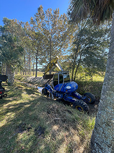 A walking “spider” excavator was deployed to the Tomoka Farms Village
